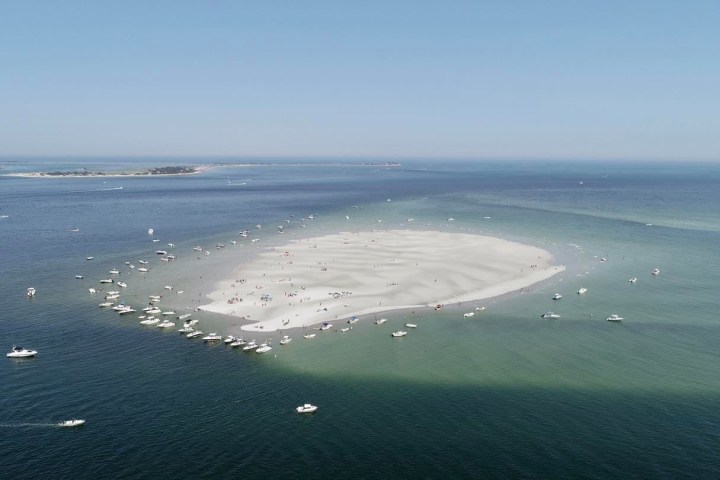 a large body of water next to the ocean