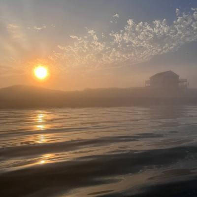 a sunset over a beach