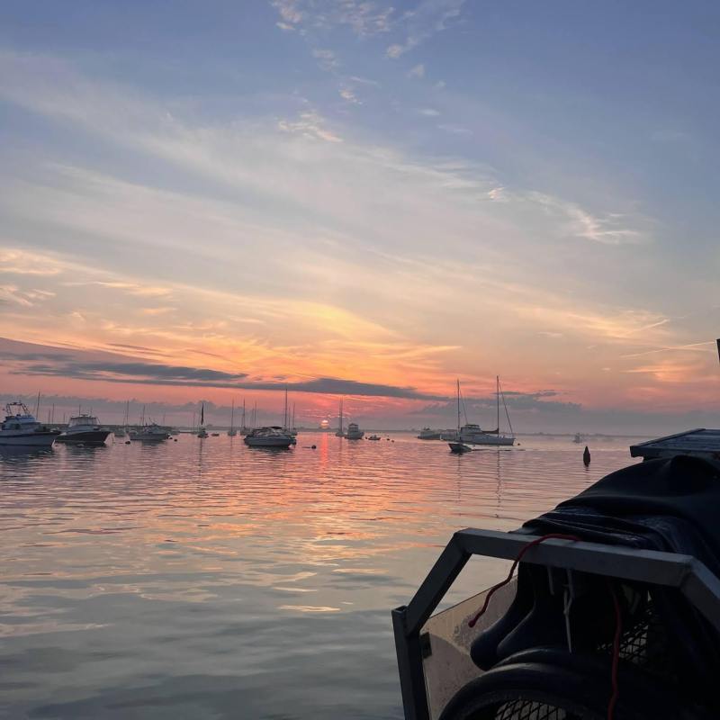 a sunset over a body of water