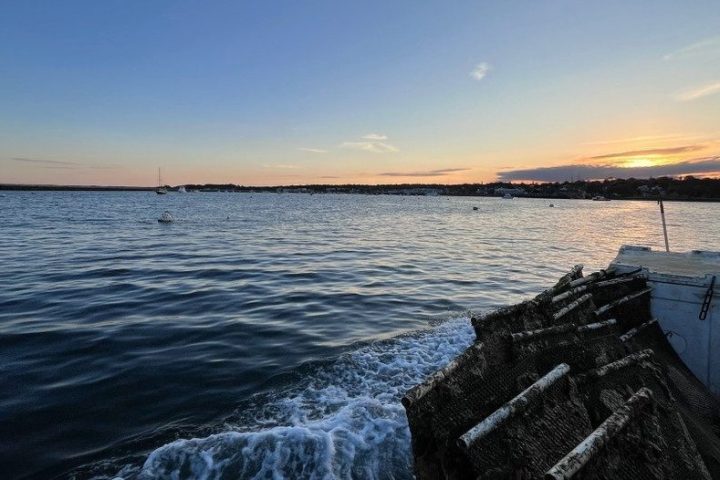 a wooden boat in a body of water