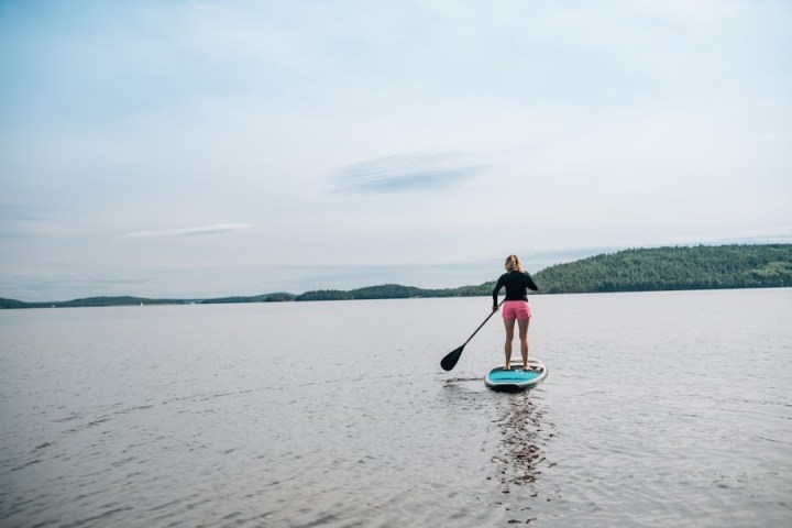 a man in a boat on a body of water