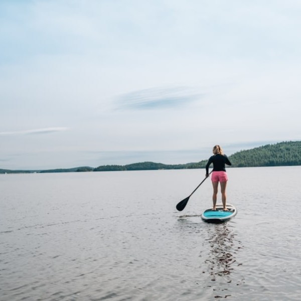a man in a boat on a body of water